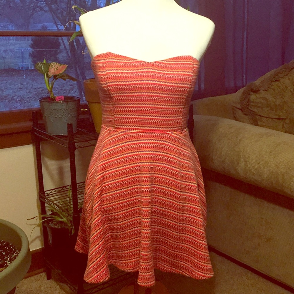 Strapless open back mini dress